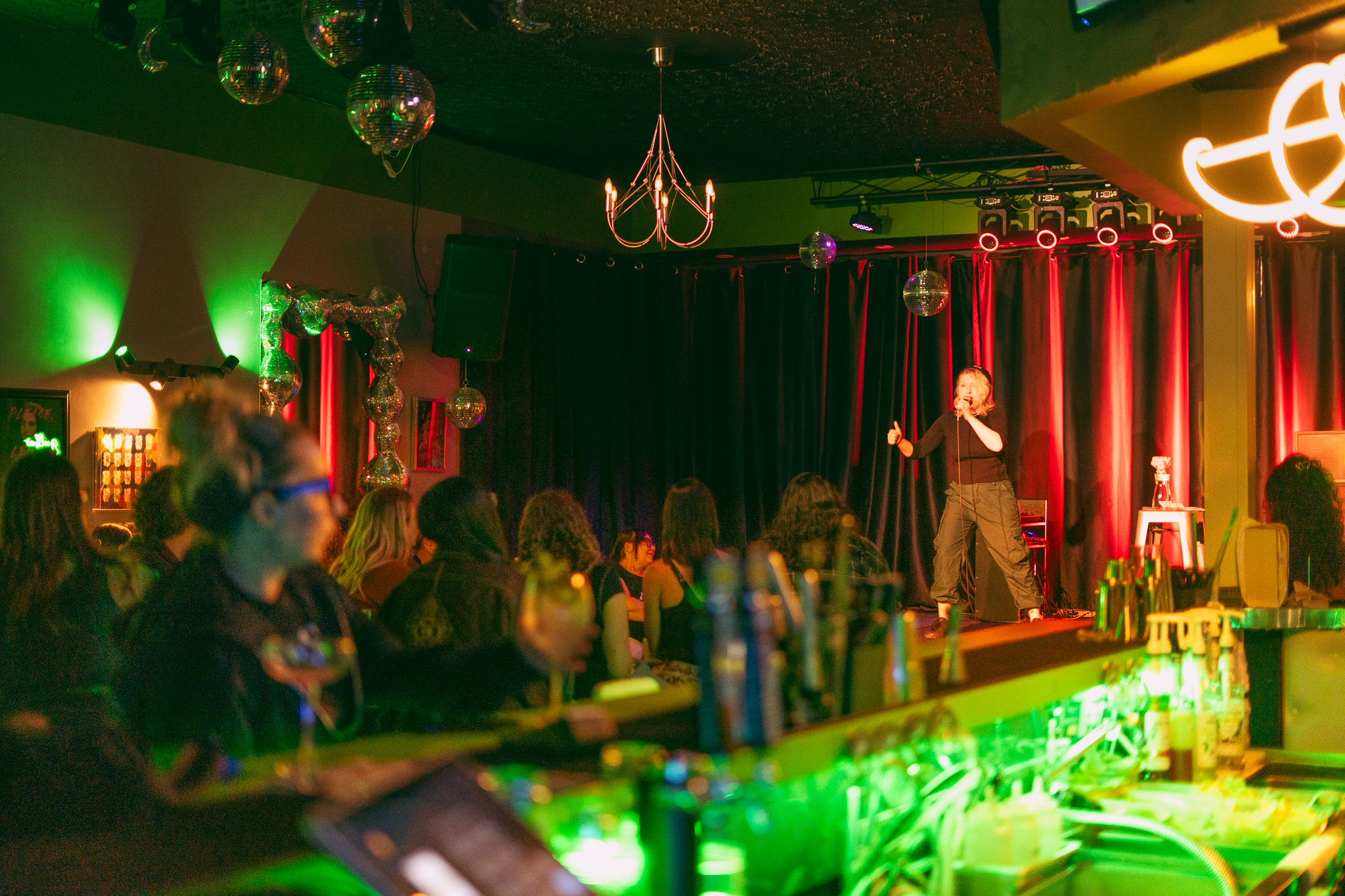 Victoria banner performing for a crowd of people